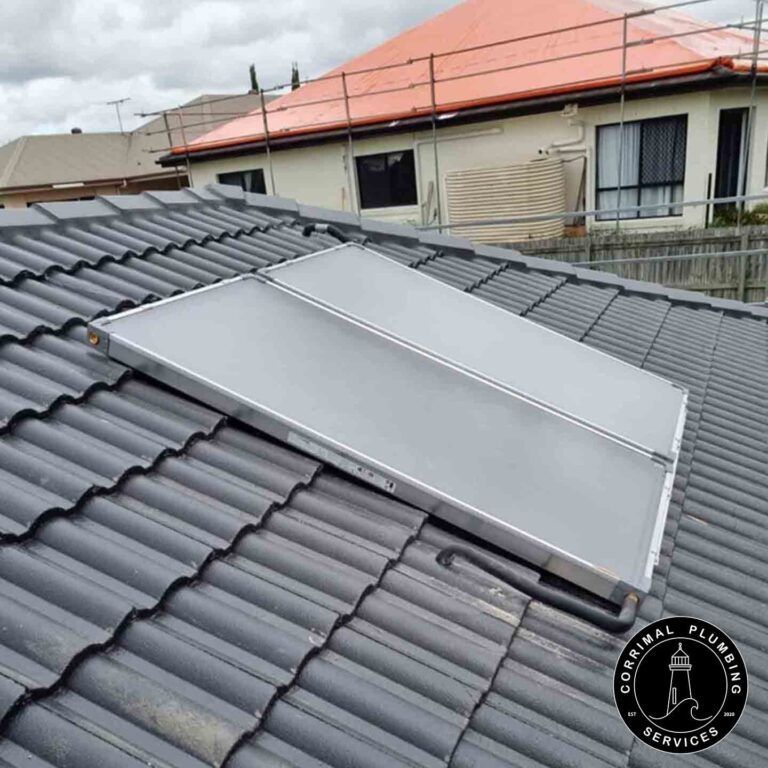 Solar Panels on a Tiled Roof — Corrimal Plumbing Services in East Corrimal, NSW
